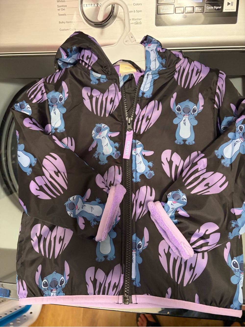 Disney Stitch Hooded Raincoat. Black with Blue Stitch and Purple Accents